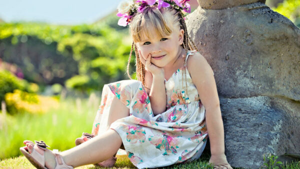 Wallpaper Little, Girl, Cute, Wearing, Stones, Green, Grass, Smiley, Colorful, Printed, Flowers, Dress, Sitting, Background