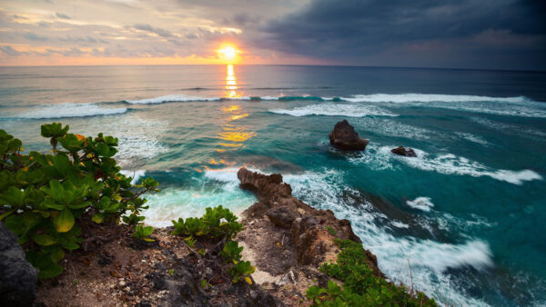 Wallpaper Sunset, During, Ocean, Waves, Bushes, White, Black, Sky, Sea, Clouds, Under, Stones, Plants, Green, Reflection, Rocks